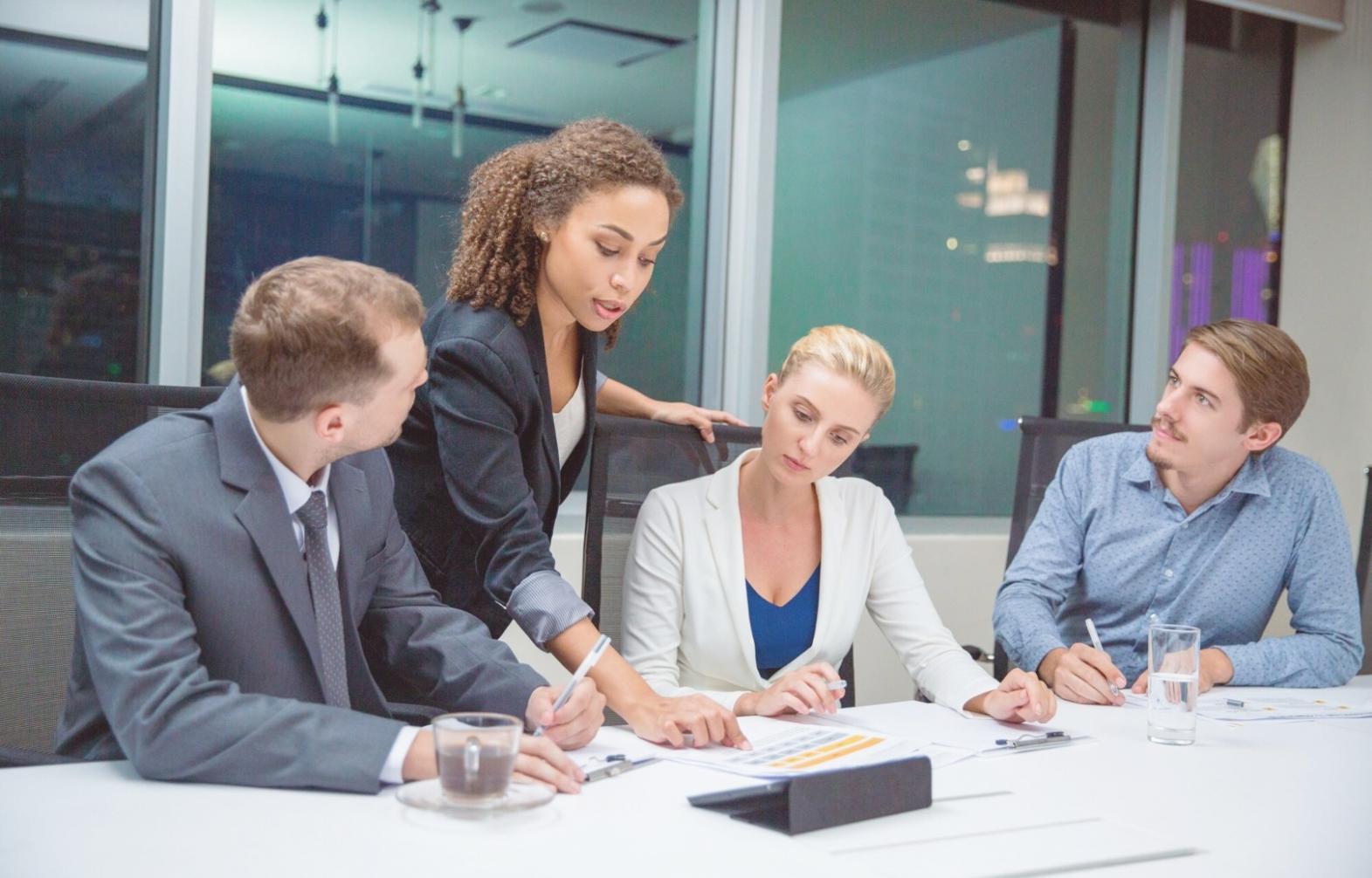 Insurance policy documents being reviewed with detailed analysis and recommendations